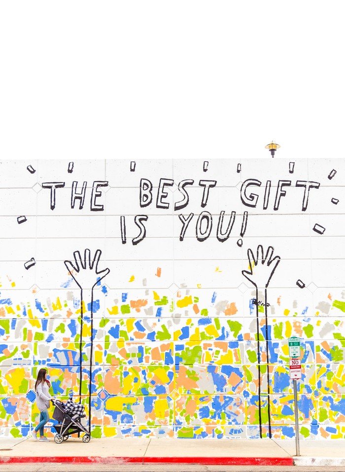 Wandbild: „The Best Gift Is You!“ mit Mosaik-Stil farbenfroher Kunst.